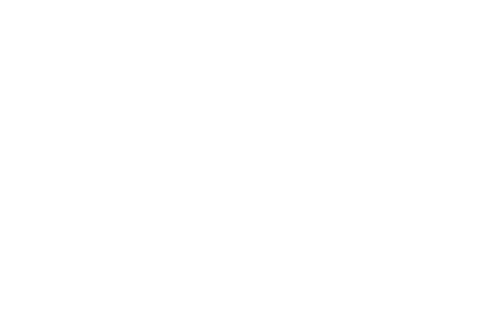 The logo for The Silvergate contains ornate swirls and vines.